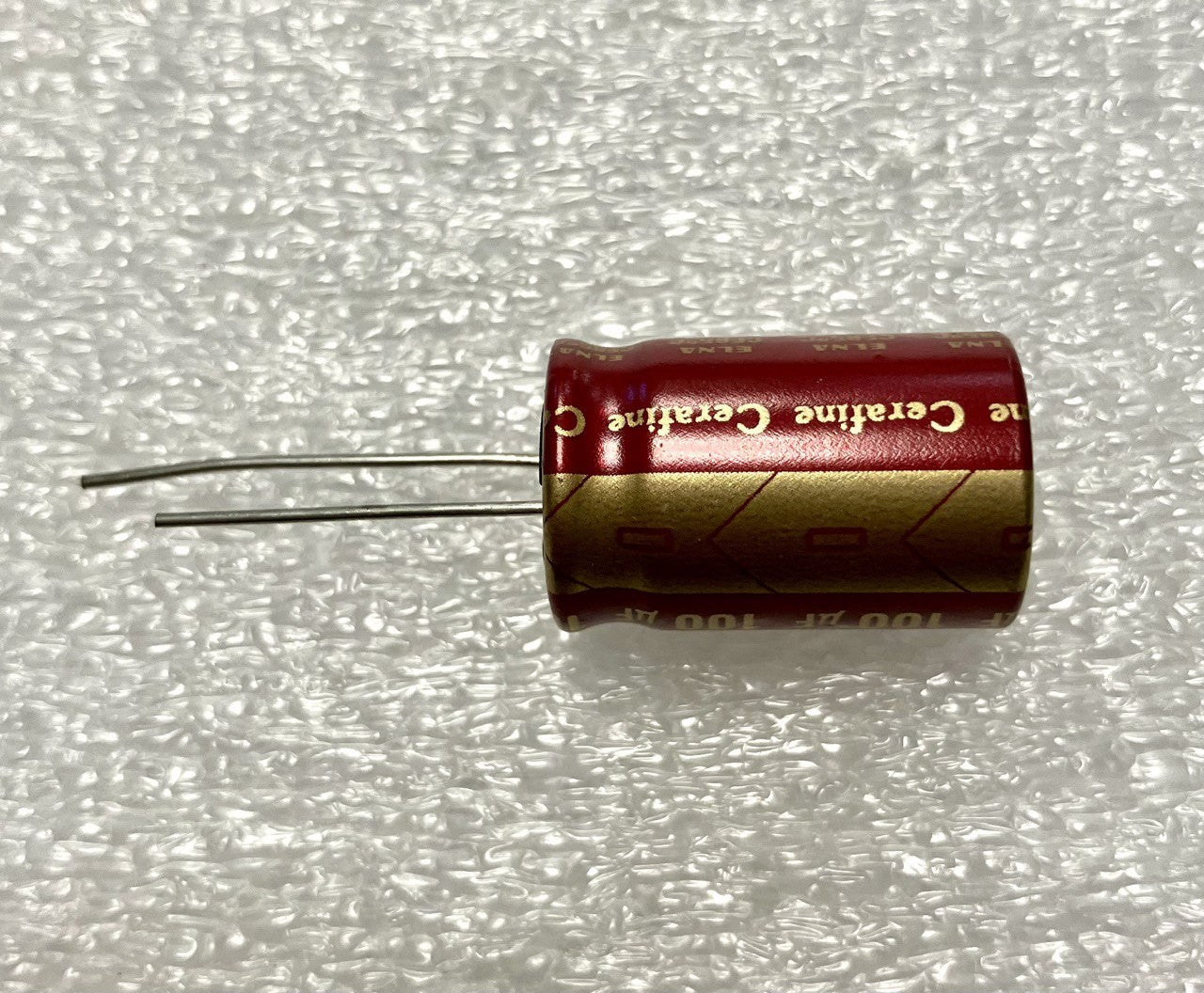 100uf 100v Elna Cerafine Red Box - Condensatore elettrolitico verticale