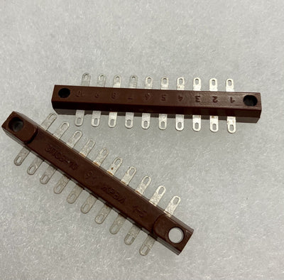 Barrette bachelite con ancoraggi di rame stagnato